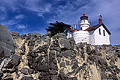 To get this shot I climbed out on the rocks on the ocean side of the island. I am not sure if the rocks are natural or man-made due to the extensive erosion. Crescent City, CA. 'Nikon F100 35mm SLR' (Click for larger view)