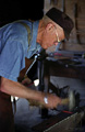 Blacksmith making a flint striker for fire starting. Coloma, CA. 'Nikon F100 35mm SLR' (Click for larger view)