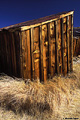 I liked the look of the dry grass around this building. Bodie, CA. 'Nikon F100 35mm SLR' (Click for larger view)