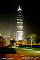 This is the world's third tallest building the 'Jin Mao Building' housing 'The Grand Hyatt', located in Shanghai, Peoples Republic of China. The outer surface looks to be stainless steel and almost looks like external scaffolding. The height is 420 meters (1381 feet). 'Minolta X-700 35mm SLR' (Click for larger view)