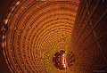 Interior view of 'The Grand Hyatt' in the 'Jin Mao Building'. Shanghai, Peoples Republic of China. This photo was taken from the observation deck down through the center of the building. Even though it appears to be a long way down, the view is only about one third down the height of the building to the 56th floor. 'Minolta X-700 35mm SLR' (Click for larger view)