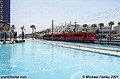 Light rail train passing by the shallow pond. San Diego, CA 'Nikon F100 35mm SLR' (Click for larger view)