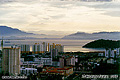 I thought the early morning mist over the distant hills was a interesting contrast to the modern buildings. Penang, Malaysia. 'Minolta X-700 35mm SLR' (Click for larger view)