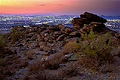 This picture has the lights of Phoenix in the background with an interesting rock formation found at South Mountain Park. Phoenix, AZ. 'Nikon F100 35mm SLR' (Click for larger view)