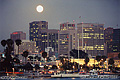 A little later the moon was in full view above the buildings in downtown. San Diego, CA 'Minolta X700 35mm SLR' (Click for larger view)