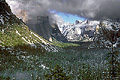 This is a picture overlooking Yosemite Valley. El Capitan on the left is half covered in the clouds, Half Dome is just peeking through and Bridalveil falls on the right was flowing so lightly that it cannot be seen. 'Nikon F100 35mm SLR' (Click for larger view)