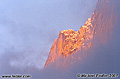 Late afternoon sun on Half Dome as the fog keeps changing the view. 'Nikon F100 35mm SLR' (Click for larger view)