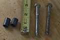Bolts and plastic sleeves used for bending aluminum rod (Click for larger view)