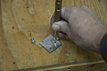 Step 3 of makeing a ground clamp - center punching the drill point (Click for larger view)