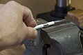 Step 4 of makeing a cross rod bracket - crimping one of the clamp loops (Click for larger view)