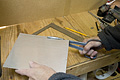 Cutting aluminum strip with tin snips (Click for larger view)
