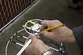 Step 2 of makeing a mast cross rod bracket - Marking the strap in preparation for second bend (Click for larger view)